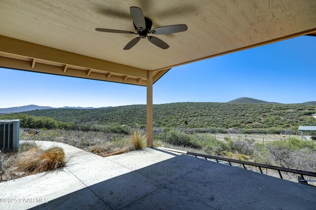 10412 E Prescott Dells Ranch Rd, Dewey-Humboldt, AZ 86327 - view of patio with a mountain view and a ceiling fan