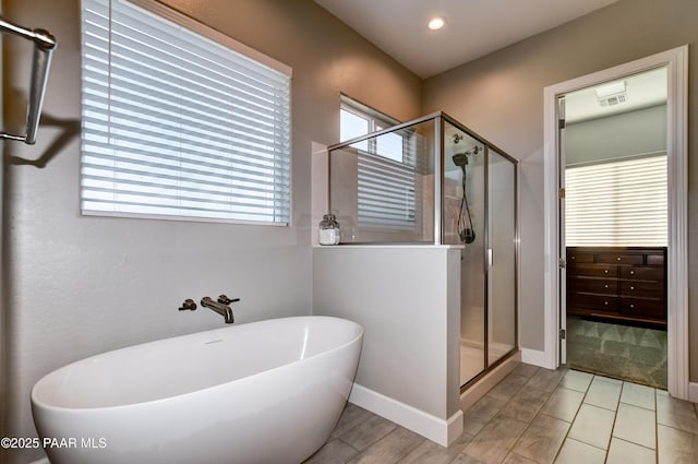 7028 Corral Ct, Prescott, AZ 86305 - full bathroom with a shower stall, a soaking tub, and recessed lighting