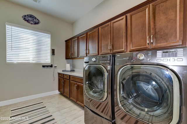 7028 Corral Ct, Prescott, AZ 86305 - laundry room featuring washer and dryer and cabinet space