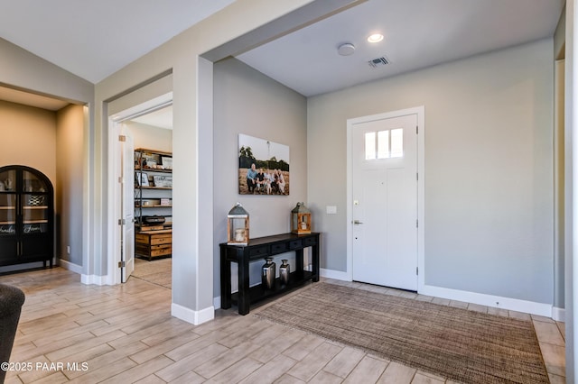 7028 Corral Ct, Prescott, AZ 86305 - foyer with light wood-type flooring and baseboards