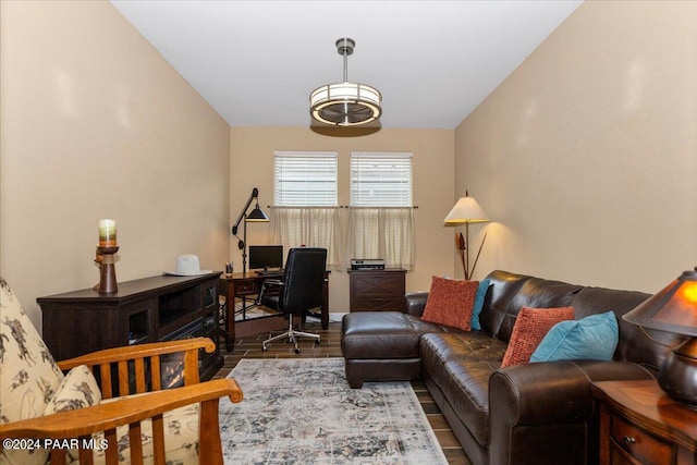 living room with lofted ceiling and hardwood / wood-style flooring