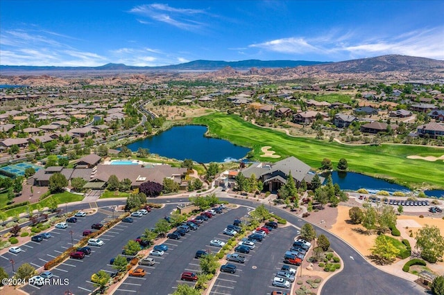 bird's eye view featuring a water and mountain view