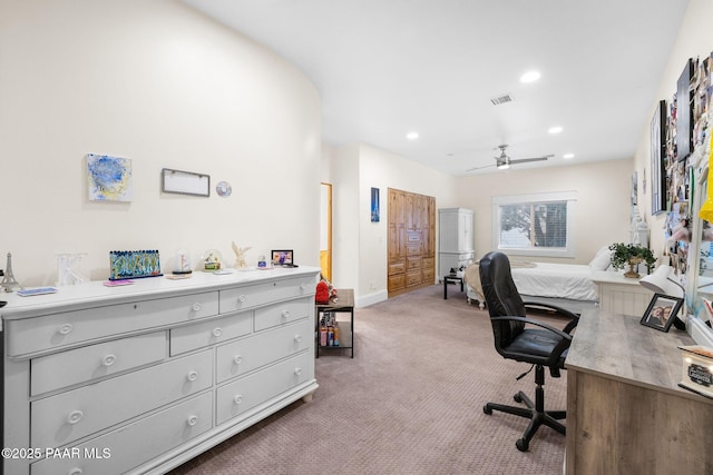 office area featuring ceiling fan and dark colored carpet