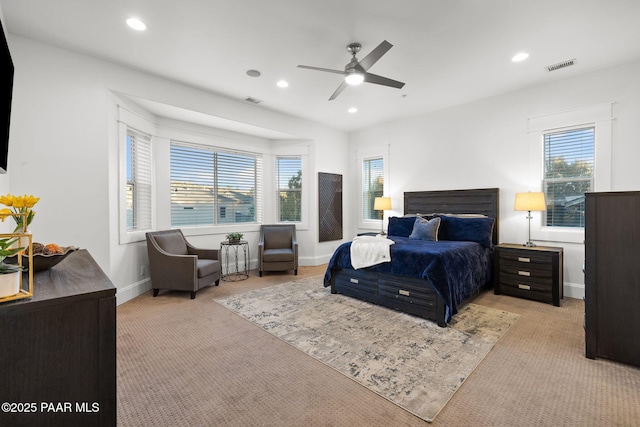 carpeted bedroom with ceiling fan