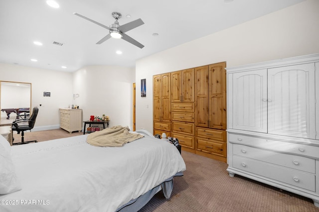 carpeted bedroom with ceiling fan