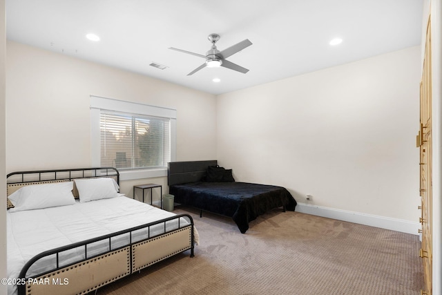 carpeted bedroom featuring ceiling fan