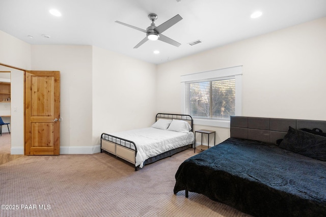 carpeted bedroom with ceiling fan