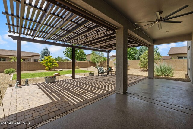 view of patio / terrace with a fenced backyard and ceiling fan