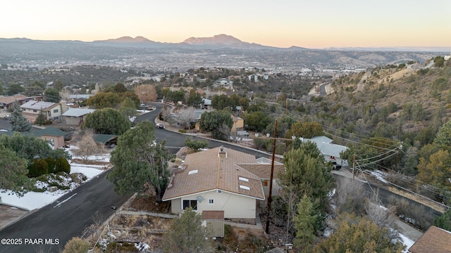 aerial view at dusk with a mountain view