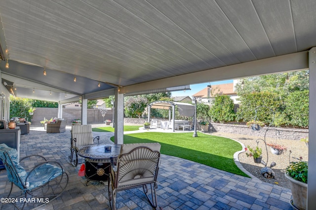 view of patio featuring a pergola