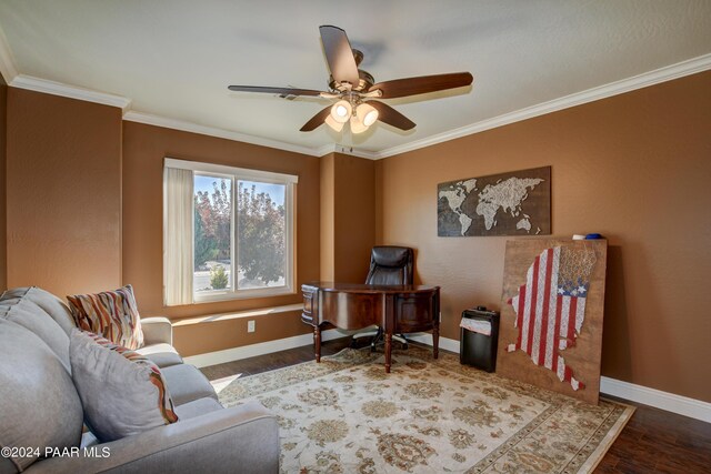 home office featuring ceiling fan, ornamental molding, and hardwood / wood-style flooring