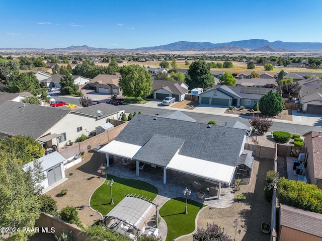 drone / aerial view featuring a mountain view