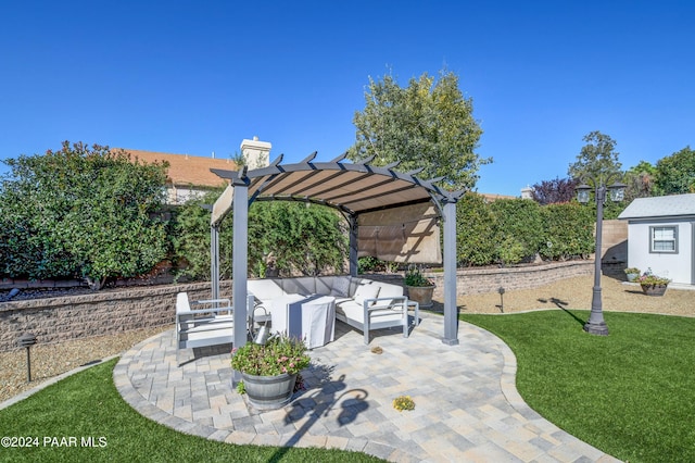 view of patio / terrace with an outdoor living space and a pergola