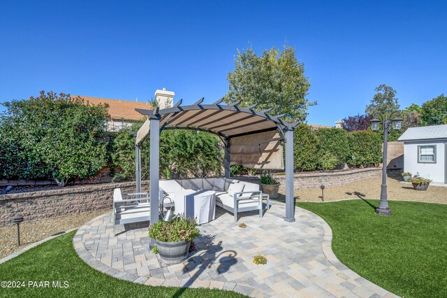 view of patio / terrace with an outdoor living space and a pergola