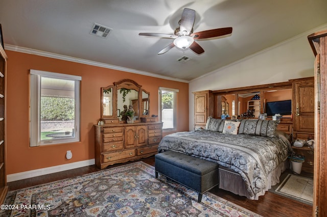 bedroom with ceiling fan, dark hardwood / wood-style flooring, lofted ceiling, and crown molding