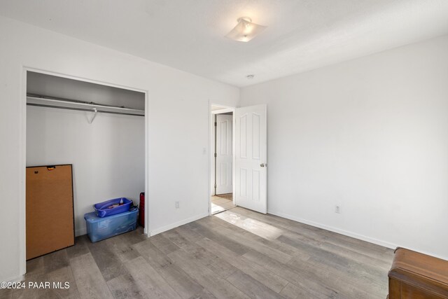 bedroom with light hardwood / wood-style flooring