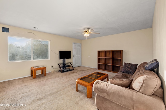 living room with carpet flooring and ceiling fan