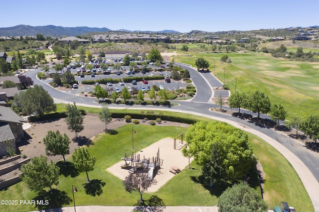 birds eye view of property with a mountain view