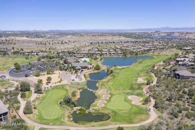 birds eye view of property featuring a residential view, a water view, and golf course view