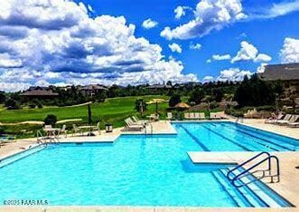 pool featuring a patio area