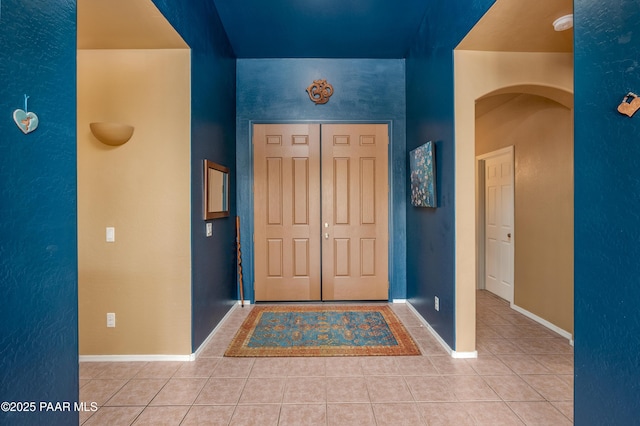 2315 W Desert Willow Dr, Cottonwood, AZ 86326 - entrance foyer with tile patterned floors, baseboards, and arched walkways
