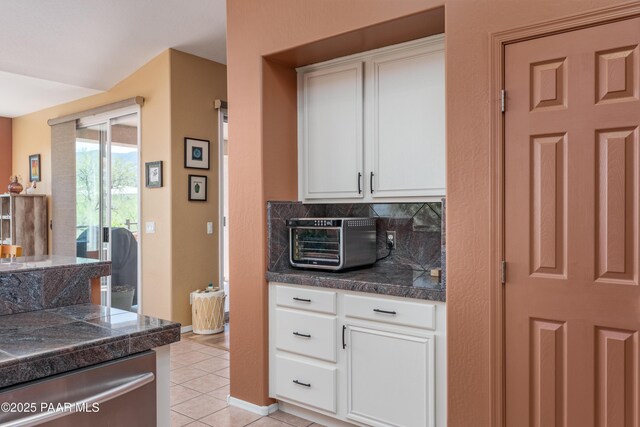2315 W Desert Willow Dr, Cottonwood, AZ 86326 - kitchen featuring light tile patterned flooring, tile counters, backsplash, a toaster, and stainless steel dishwasher