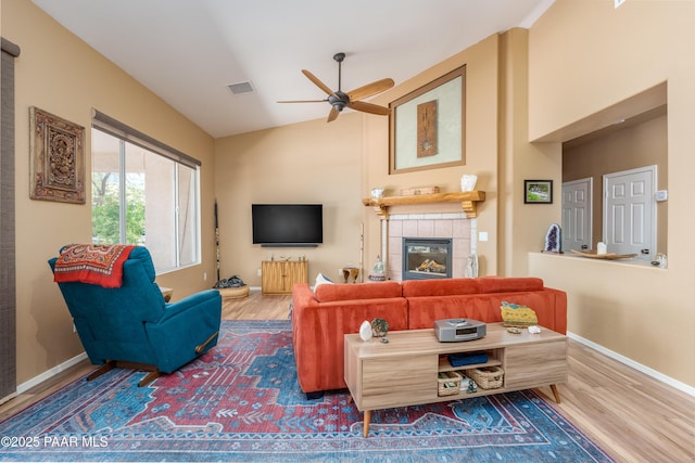 2315 W Desert Willow Dr, Cottonwood, AZ 86326 - living area with visible vents, wood finished floors, baseboards, a ceiling fan, and vaulted ceiling