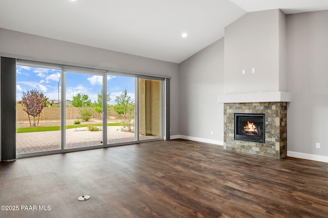 5385 Rocky Vista Dr, Prescott, AZ 86301 - unfurnished living room with wood finished floors, a glass covered fireplace, recessed lighting, and high vaulted ceiling