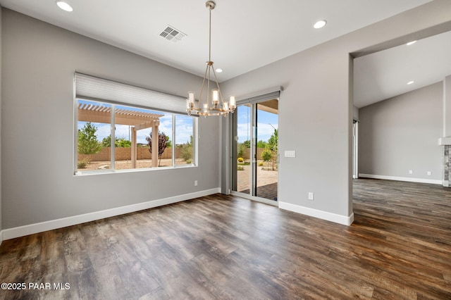 5385 Rocky Vista Dr, Prescott, AZ 86301 - empty room featuring a chandelier, dark wood finished floors, and recessed lighting