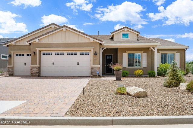 5385 Rocky Vista Dr, Prescott, AZ 86301 - view of front of property with stone siding, an attached garage, and decorative driveway