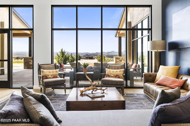 5385 Rocky Vista Dr, Prescott, AZ 86301 - living room with a mountain view, wood finished floors, a wall of windows, and a high ceiling