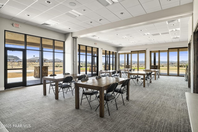 5385 Rocky Vista Dr, Prescott, AZ 86301 - carpeted dining room featuring a paneled ceiling, plenty of natural light, and a mountain view