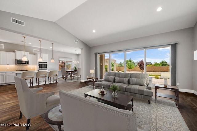 5385 Rocky Vista Dr, Prescott, AZ 86301 - living room with vaulted ceiling, dark wood-style floors, and recessed lighting