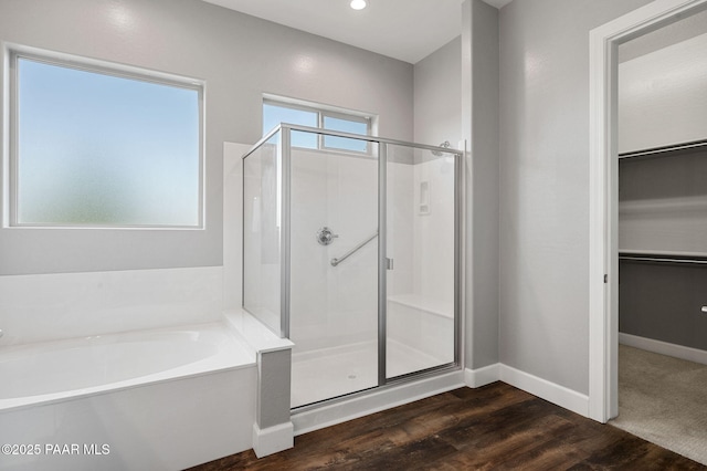 5385 Rocky Vista Dr, Prescott, AZ 86301 - full bath with a stall shower, a bath, wood finished floors, and a spacious closet