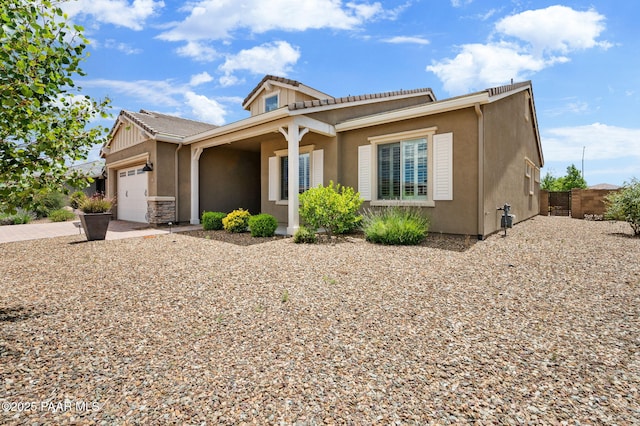 5385 Rocky Vista Dr, Prescott, AZ 86301 - view of front facade featuring a garage, stucco siding, and driveway