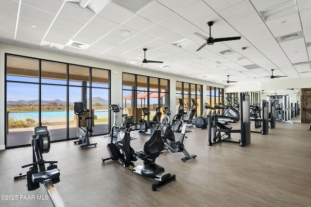 5385 Rocky Vista Dr, Prescott, AZ 86301 - gym featuring a ceiling fan, a mountain view, and a paneled ceiling