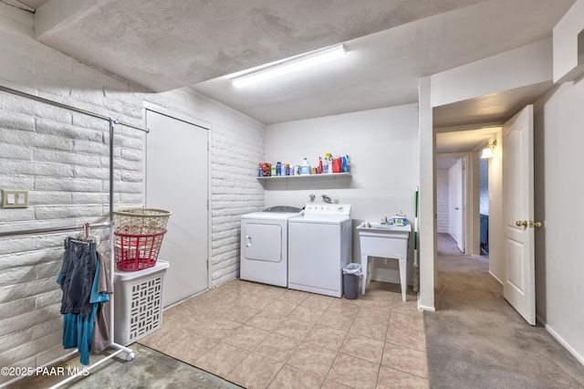 2345 Shinnery Ln, Prescott, AZ 86301 - laundry area with washer and clothes dryer and light tile patterned floors