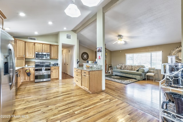 2345 Shinnery Ln, Prescott, AZ 86301 - kitchen featuring appliances with stainless steel finishes, light wood-style floors, a ceiling fan, lofted ceiling, and open floor plan