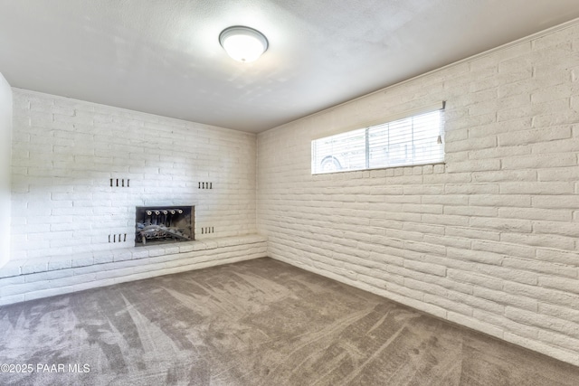 2345 Shinnery Ln, Prescott, AZ 86301 - unfurnished living room with carpet and a brick fireplace