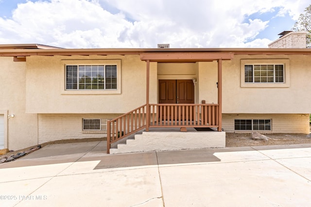 2345 Shinnery Ln, Prescott, AZ 86301 - property entrance with stucco siding and a patio
