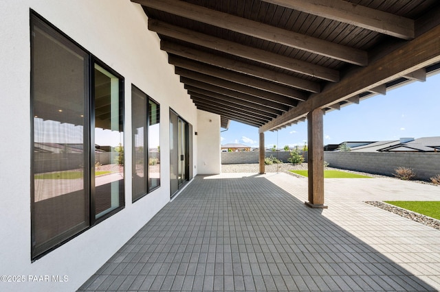 view of patio with fence