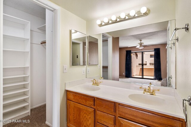 2180 Resort Way Unit S B, Prescott, AZ 86305 - bathroom with double vanity, a ceiling fan, and a closet