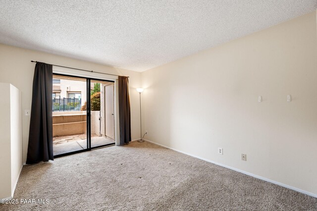 2180 Resort Way Unit S B, Prescott, AZ 86305 - carpeted spare room featuring a textured ceiling and baseboards