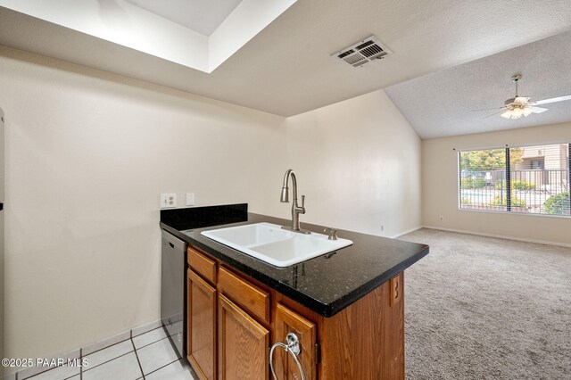 2180 Resort Way Unit S B, Prescott, AZ 86305 - kitchen featuring a sink, dark countertops, brown cabinets, dishwasher, and open floor plan