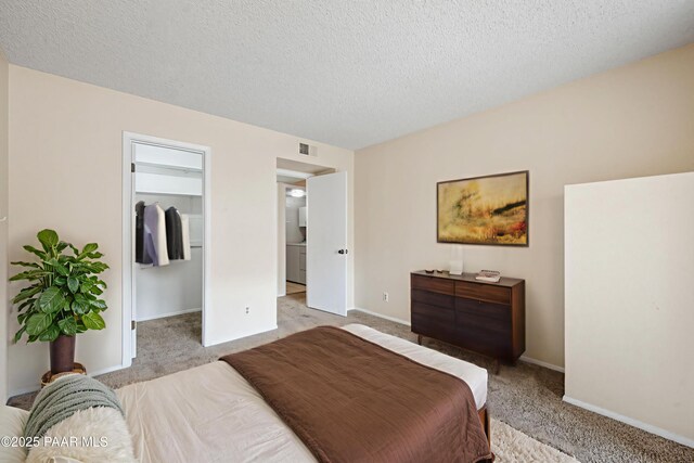 2180 Resort Way Unit S B, Prescott, AZ 86305 - carpeted bedroom with a textured ceiling, baseboards, a spacious closet, and a closet