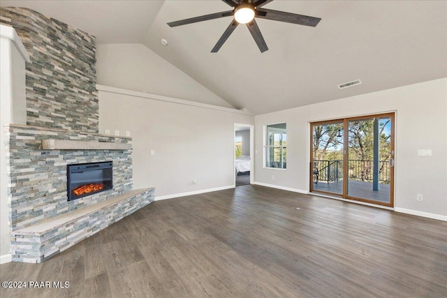 unfurnished living room featuring hardwood / wood-style floors, ceiling fan, a fireplace, and high vaulted ceiling