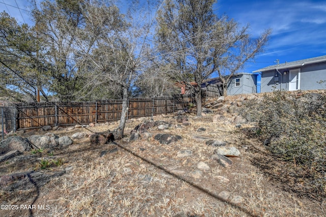 view of yard featuring fence