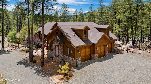 log cabin with a garage