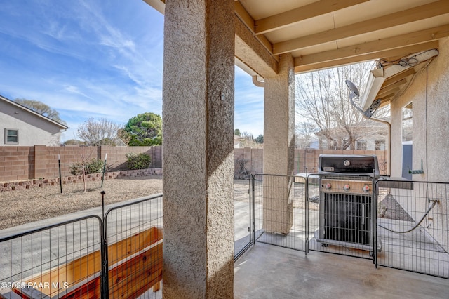 view of patio featuring central AC, a fenced backyard, and grilling area