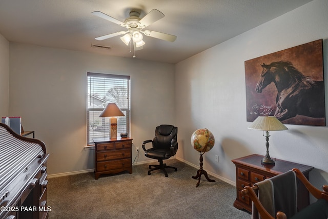 interior space with a ceiling fan, carpet, visible vents, and baseboards